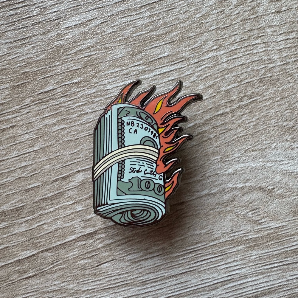 Strike Gently burning cash pin